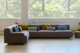 sofa chaise longue with assorted cushions
